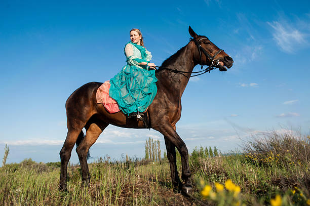 istock Horsewoman and blue sky 481755278