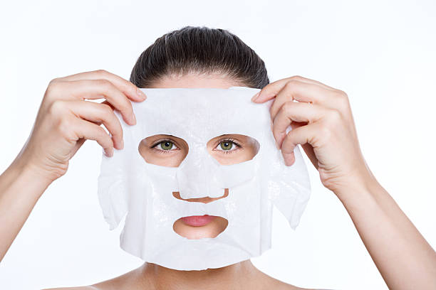 istock Woman applying beauty face mask 481756724
