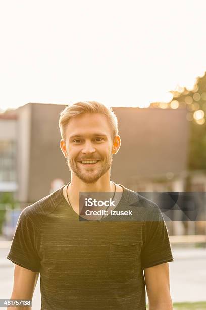 Outdoor Portrait Of Handsome Bearded Blond Hair Young Man Stock Photo - Download Image Now