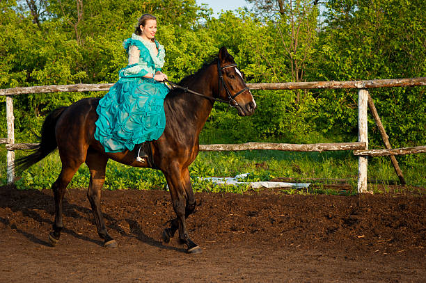istock Horsewoman riding. 481757448