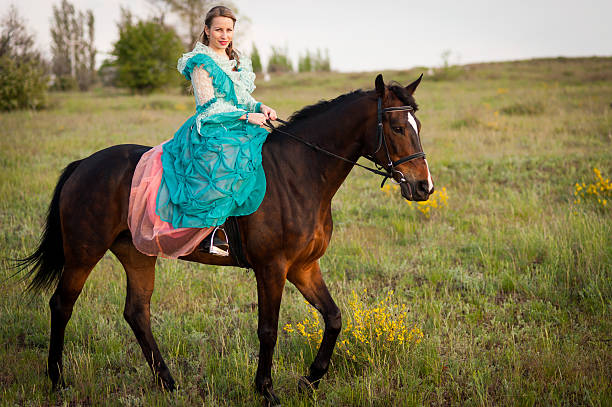 istock Horsewoman riding. 481757506