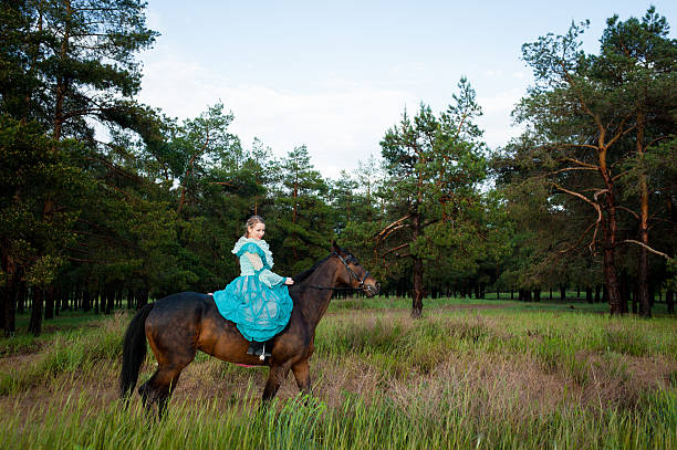 istock Horsewoman riding. 481757648