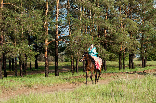 istock Horsewoman riding. 481757678