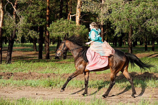 Horsewoman riding.