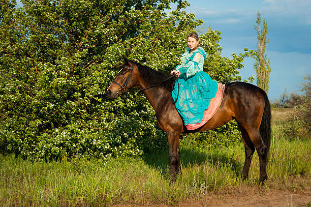 istock Horsewoman riding. 481757712
