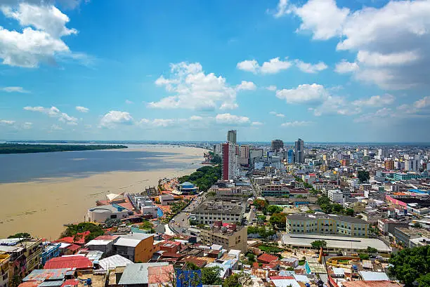Cityscape view of Guayaquil, Ecuador with the Guayas River visible on the left