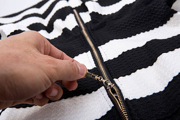 istock zipper in the black cloth and white 481760866