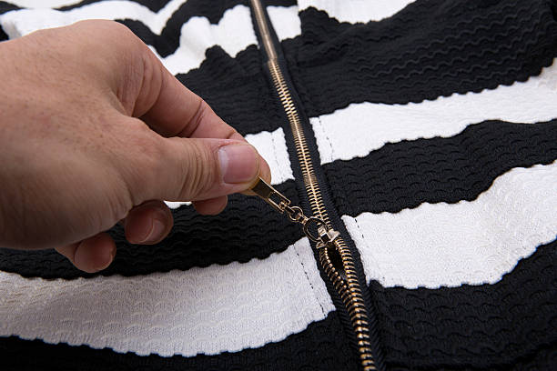 istock zipper in the black cloth and white 481760924