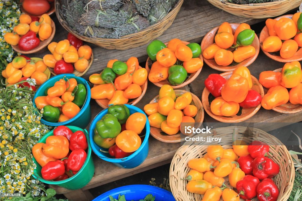 Colorful fresh peppers at a Mexican farmers market Colorful peppers for sale at a farmers market in San Cristobal de las Casas, Chiapas, Mexico 2015 Stock Photo