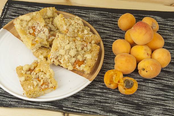 istock Homemade apricot cake on a plate. 481764972