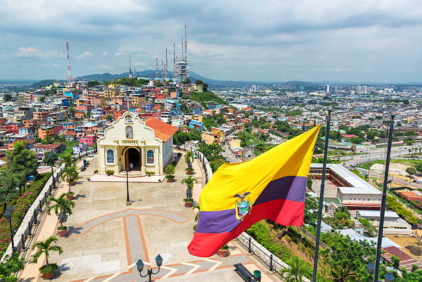 Flag and Church in Guayaquil Ecuadorian flag on top of Santa Ana hill with a church and the city of Guayaquil visible in the background in Ecuador ecuador photos stock pictures, royalty-free photos & images