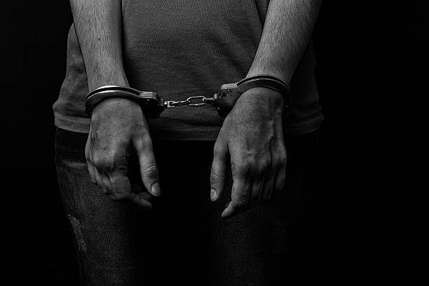 istock handcuffed the woman 481786206