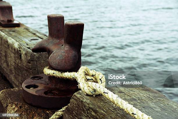 Landing Dock For Boats At The Harbor Stock Photo - Download Image Now - 2015, Anchor - Vessel Part, Bollard