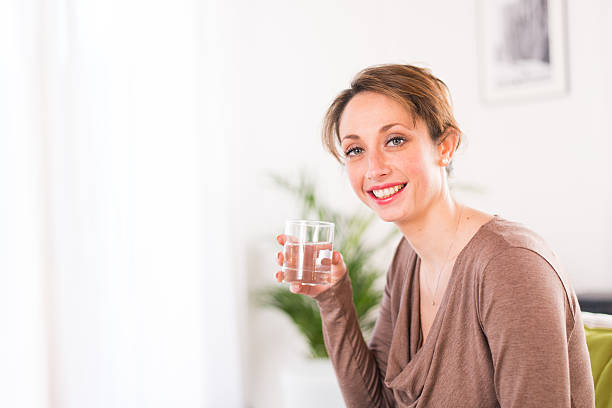 istock cheerful young women drinking mineral water 481791041