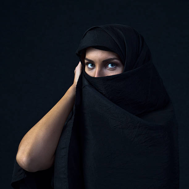 istock woman in  black 481796087
