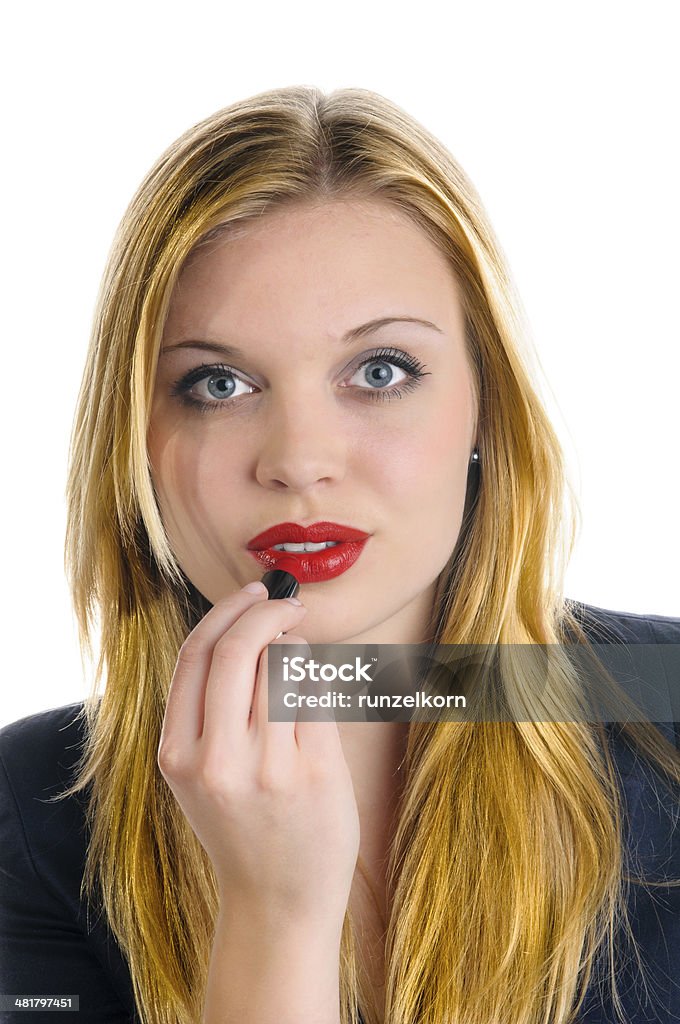 少女赤の口紅を適用する - 1人のロイヤリティフリーストックフォト