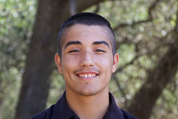 Smiling American Indian Teenage Boy Portrait stock photo