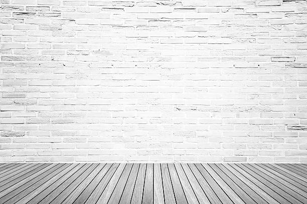 istock Old interior room with brick wall and wood floor 481806922