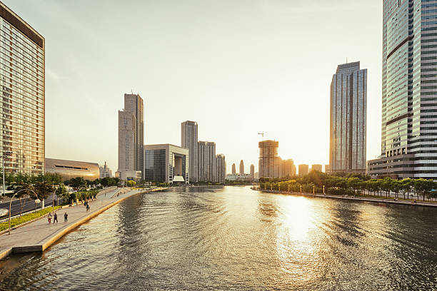 istock Modern skyline at riverbank during sunset 481807118