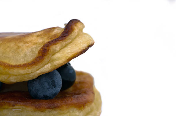 istock Delicious pancakes close up, with fresh blueberries and maple sy 481807296