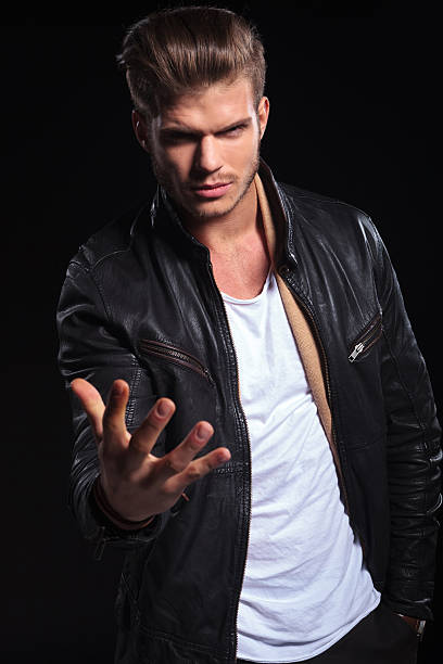 istock man in leather jacket is looking very upset 481813929