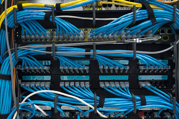 LAN cable LAN cable use server of factory 2015 stock pictures, royalty-free photos & images