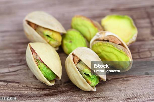 Pistachio Nuts Close Up Stock Photo - Download Image Now - Pistachio, Brown, Close-up