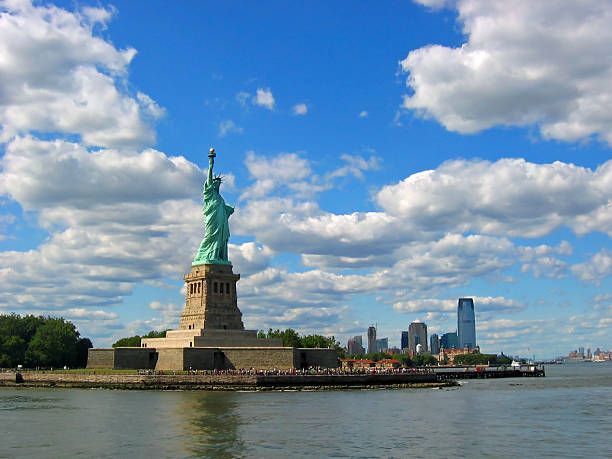 istock Statue of Liberty Overlooking New York Skyline 481826170