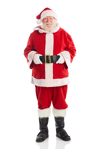 Full length portrait of old man in santa  costume smiling at the camera on white background