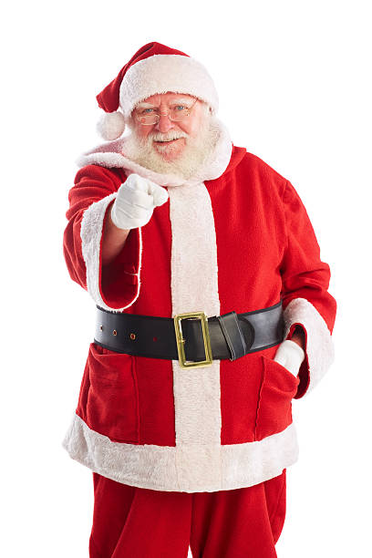 istock Santa claus pointing at camera smiling 481826748