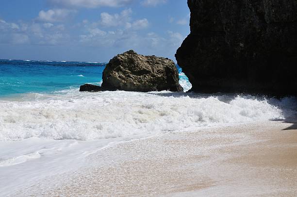 istock Waves splashing Against the Boulders 481829939