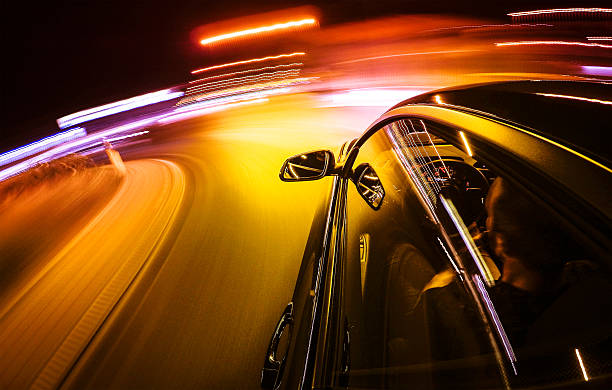 Crazy ride on the night by car Crazy ride on the night by car middle of the road stock pictures, royalty-free photos & images