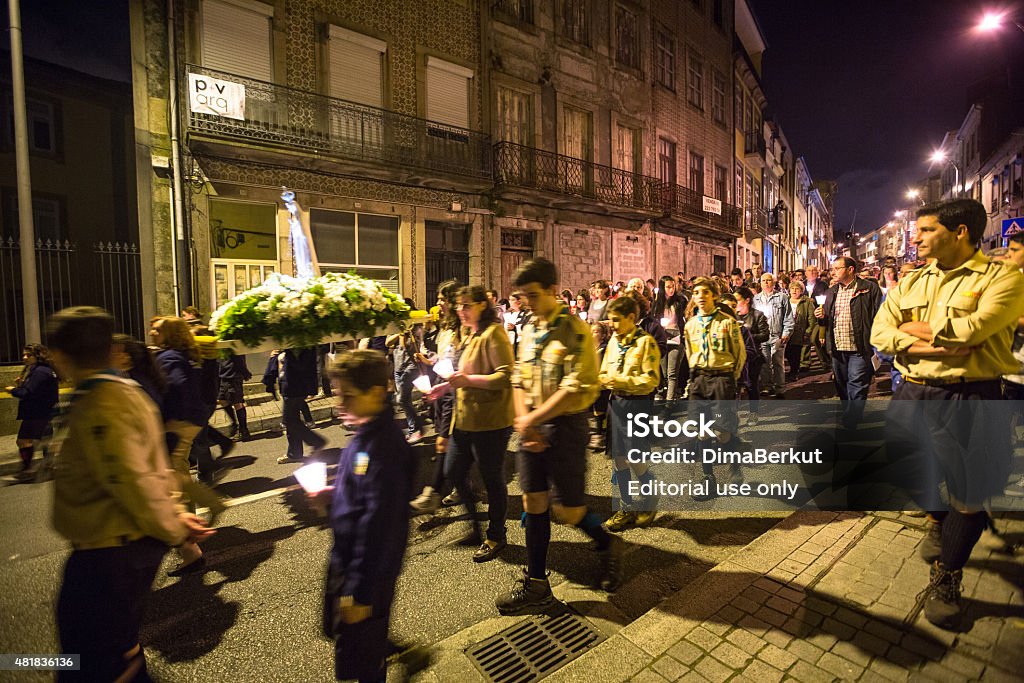 Procession in honor of Our Lady of Fatima Porto, Portugal - May 14, 2015: Procession in honor of Our Lady of Fatima. Events at Fatima gained fame due to elements of secrets, prophecy and eschatology, particularly with regard to World War II. 2015 Stock Photo