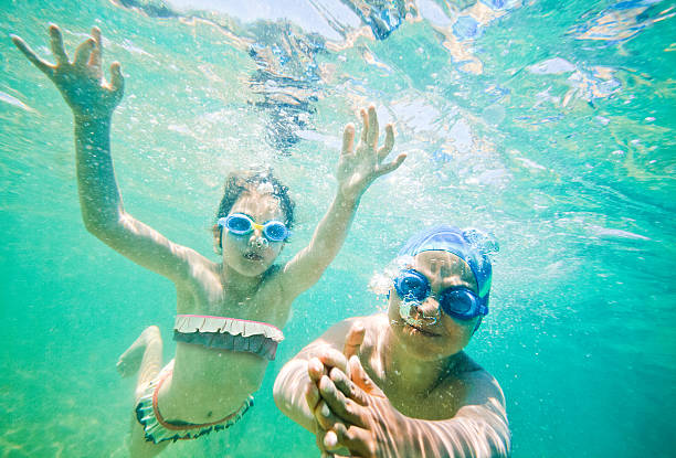 istock kids sea underwater 481836286