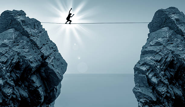 istock Man Balancing on Rope High in the Sky 481837408