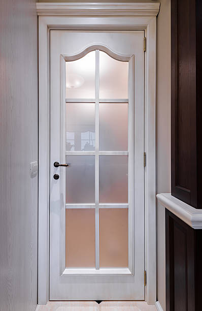 istock Wooden door with glass in interior 481837650