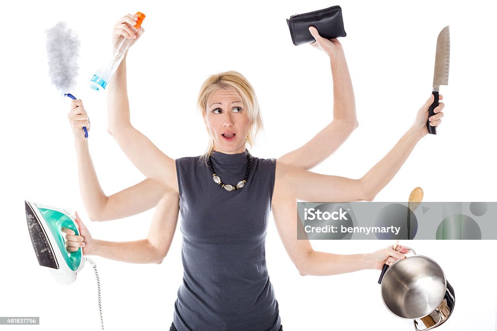 Multitasking housewife Very busy multitasking housewife on white background. Concept of supermom and superwoman. Women Stock Photo