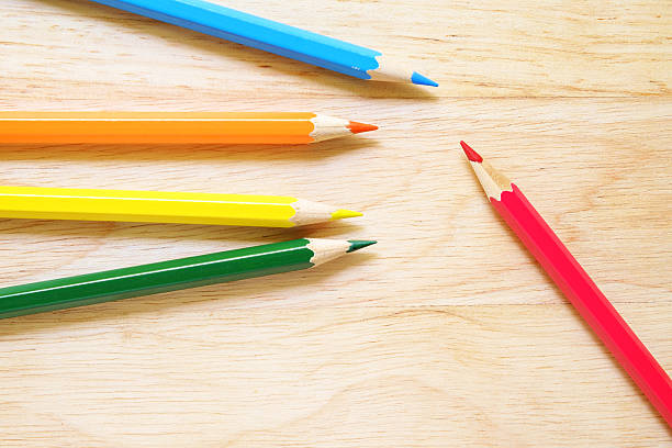istock Color pencils on wood background 481842928