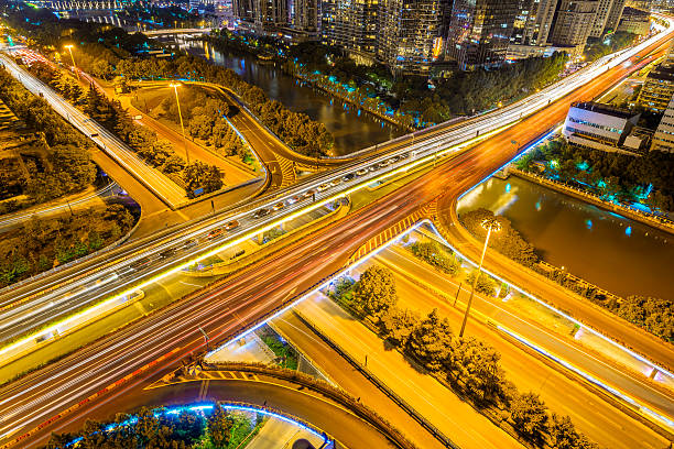 istock traffic light trails on overpass and cityscape at night 481843302