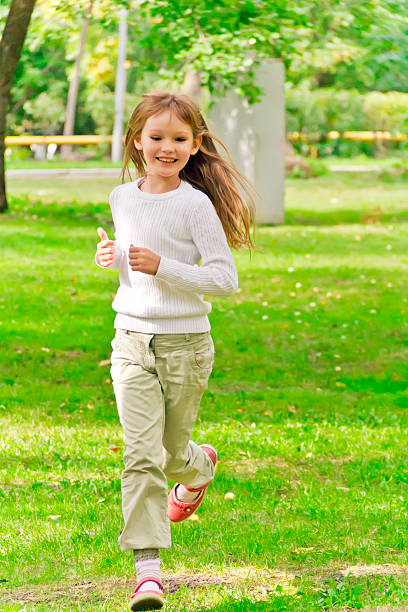 istock Cute running girl 481844840