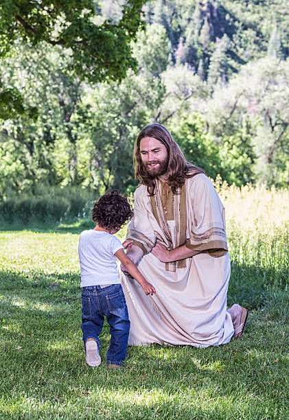 istock Little Boy Running To Kneeling Jesus Christ 481846602