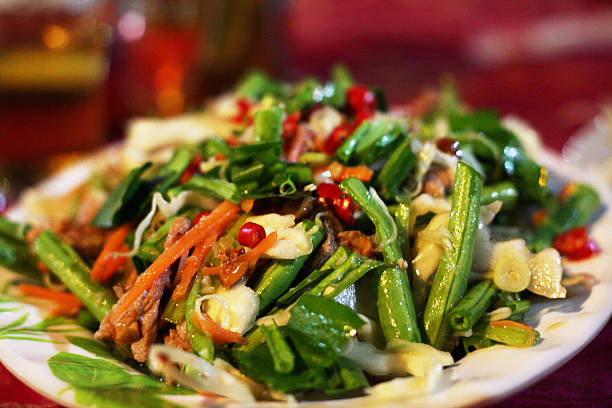 Lap Khmer: Lime-marinated Khmer beef salad Khmer beef salad features sliced beef that is quickly seared by marinating with lime juice. cambodia food stock pictures, royalty-free photos & images