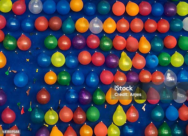 Balloons Spitting At The Fair Stock Photo - Download Image Now - Balloon, Dart, Child