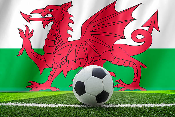 istock Wales flag and soccer ball 481860192