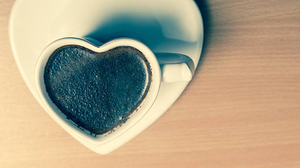 istock Coffee in heart shaped cup mug. Caffeine energy. 481864036