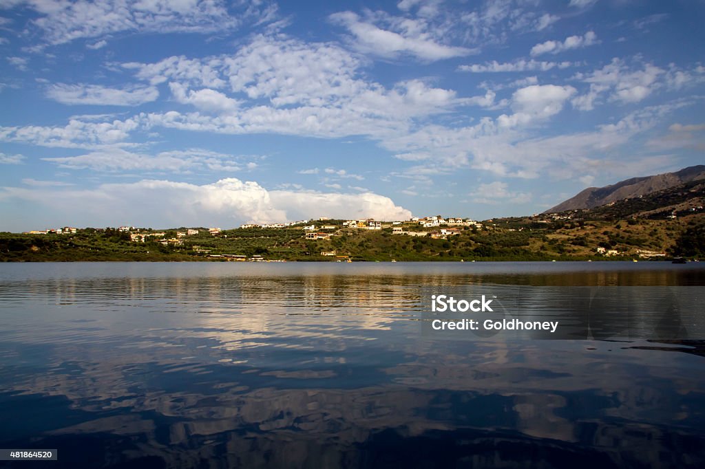 Lake Kournas Crete's (Greece, Europe) only freshwater lake. Around the lake reflected the White Mountains in the mirror-like waters. Lefka Ori Stock Photo