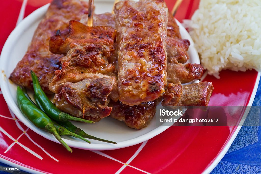 Grill sour pork from Thailand,Bamboo Shoot Salad Northeastern St Grill sour pork from Thailand,Bamboo Shoot Salad Northeastern Style,Soup Nor Mai,Thai food. 2015 Stock Photo