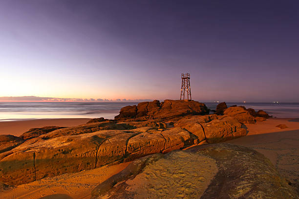 Redhead Beach - Newcastle Australia at sunrise. The beaches iconic wooden tower was used to look for sharks.