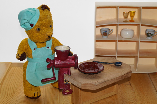 Old teddy bear, Bear Morulet in kitchen
