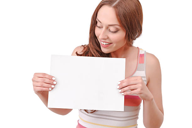 istock Pretty red-haired woman holding paper board 481873316